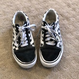 Checkered black and white vans